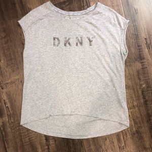 Sleeveless high low glitter logo top